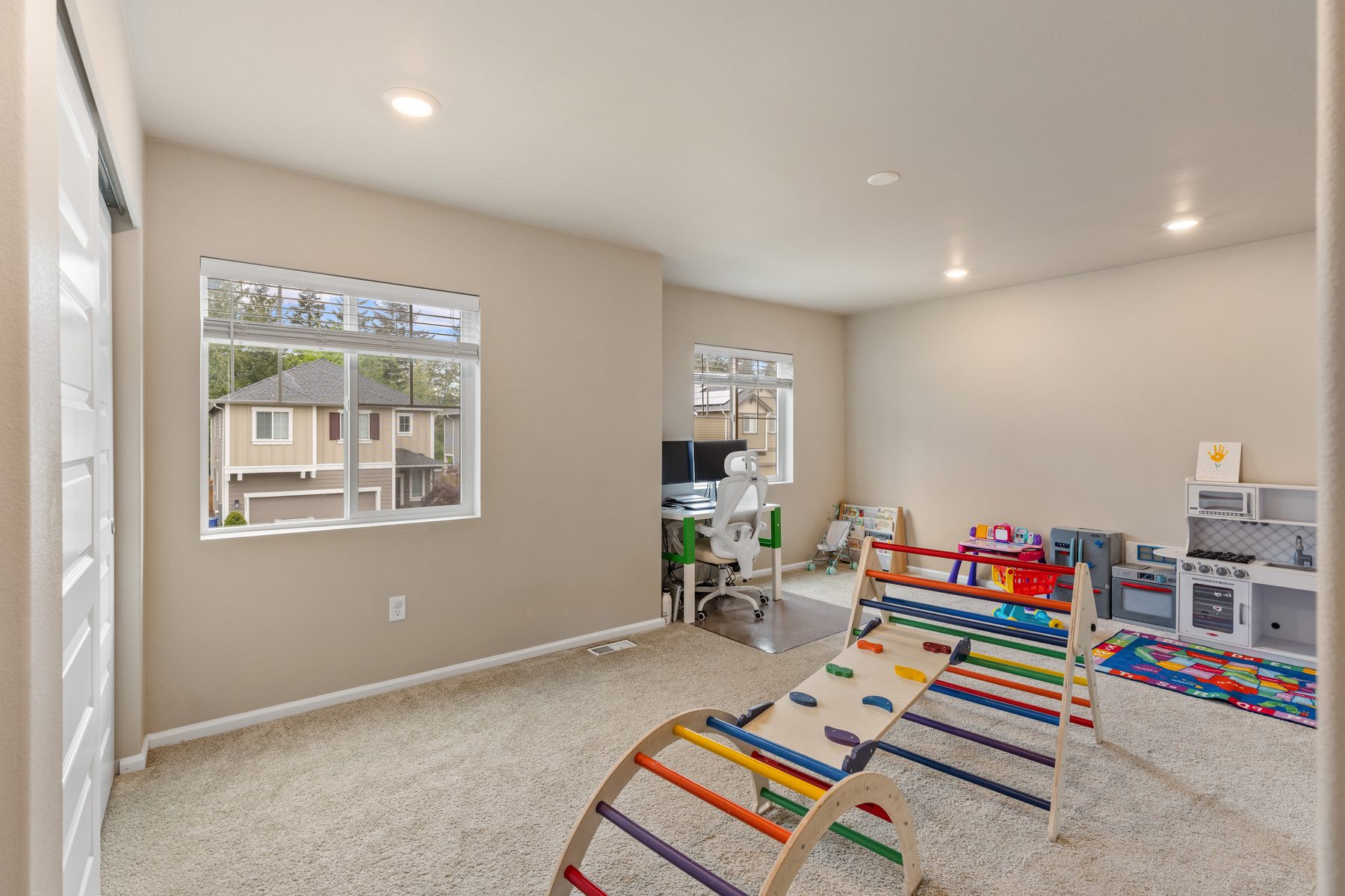 Upstairs loft — flexes to playroom, media, or quiet study