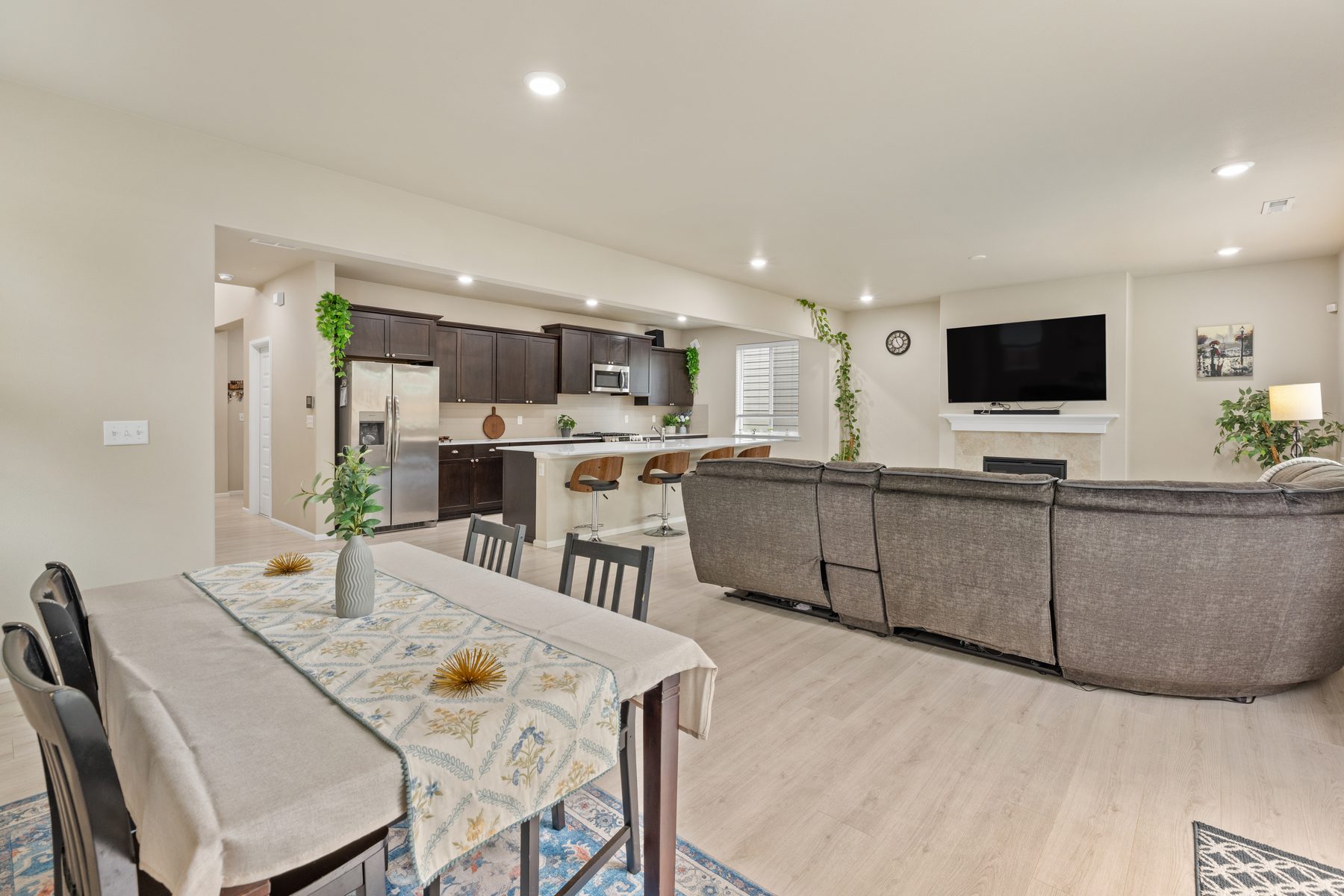 Open-concept main floor — kitchen, dining, and great room