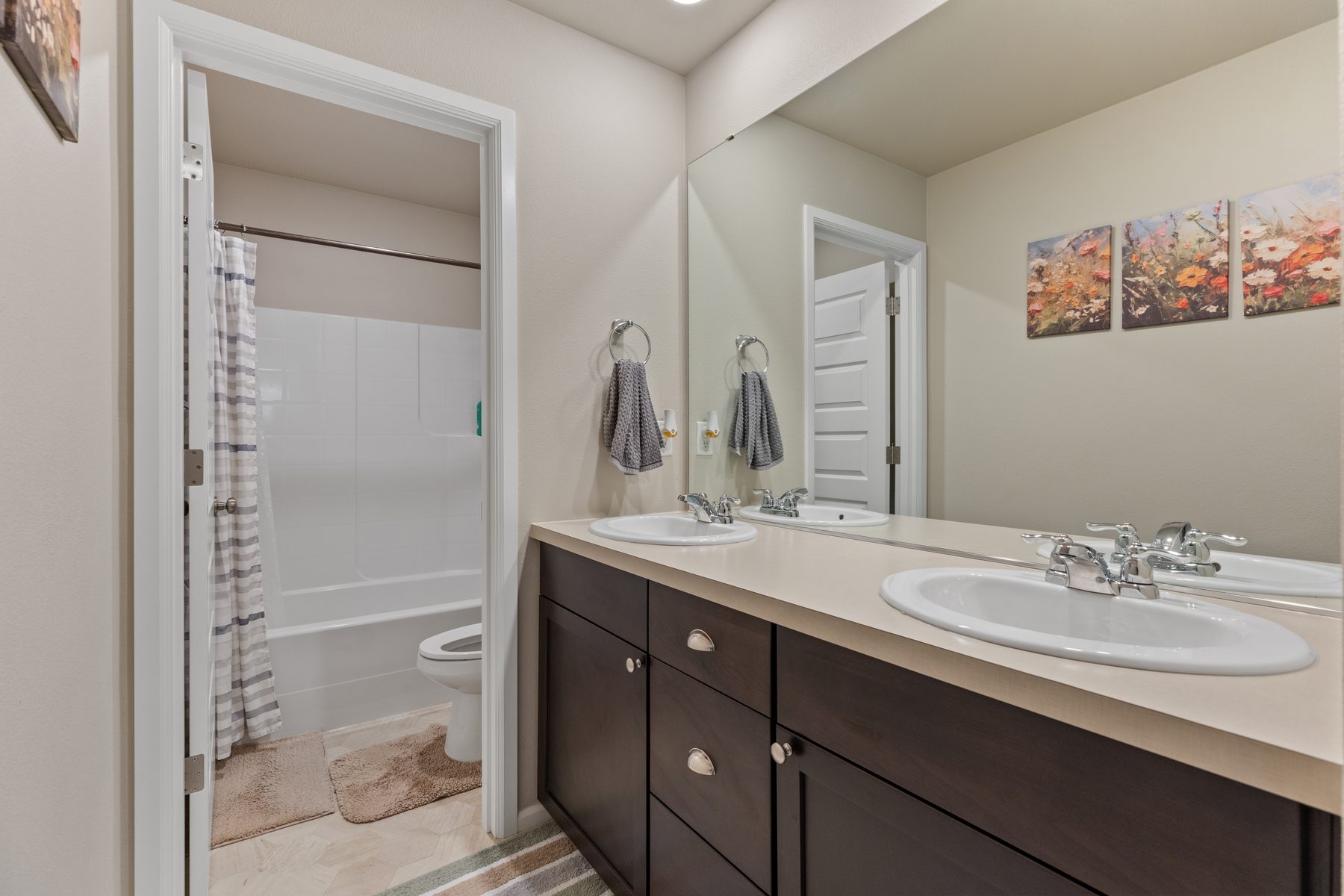 Secondary full bath with tub and double vanity