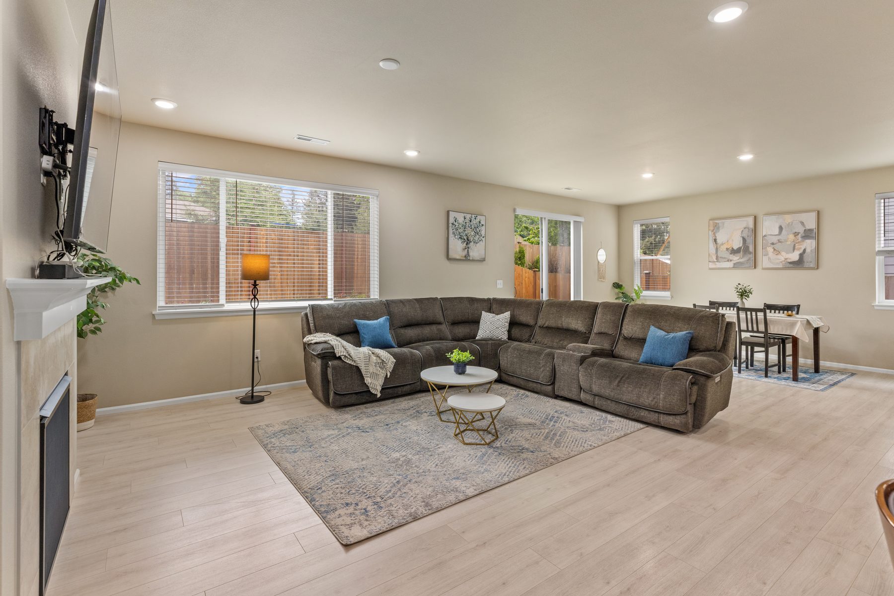 Great room with sectional and dining beyond